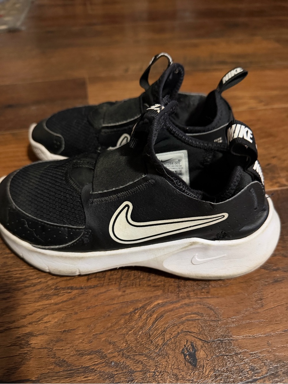 Nike Kids Black and White Slip-On Sneakers
